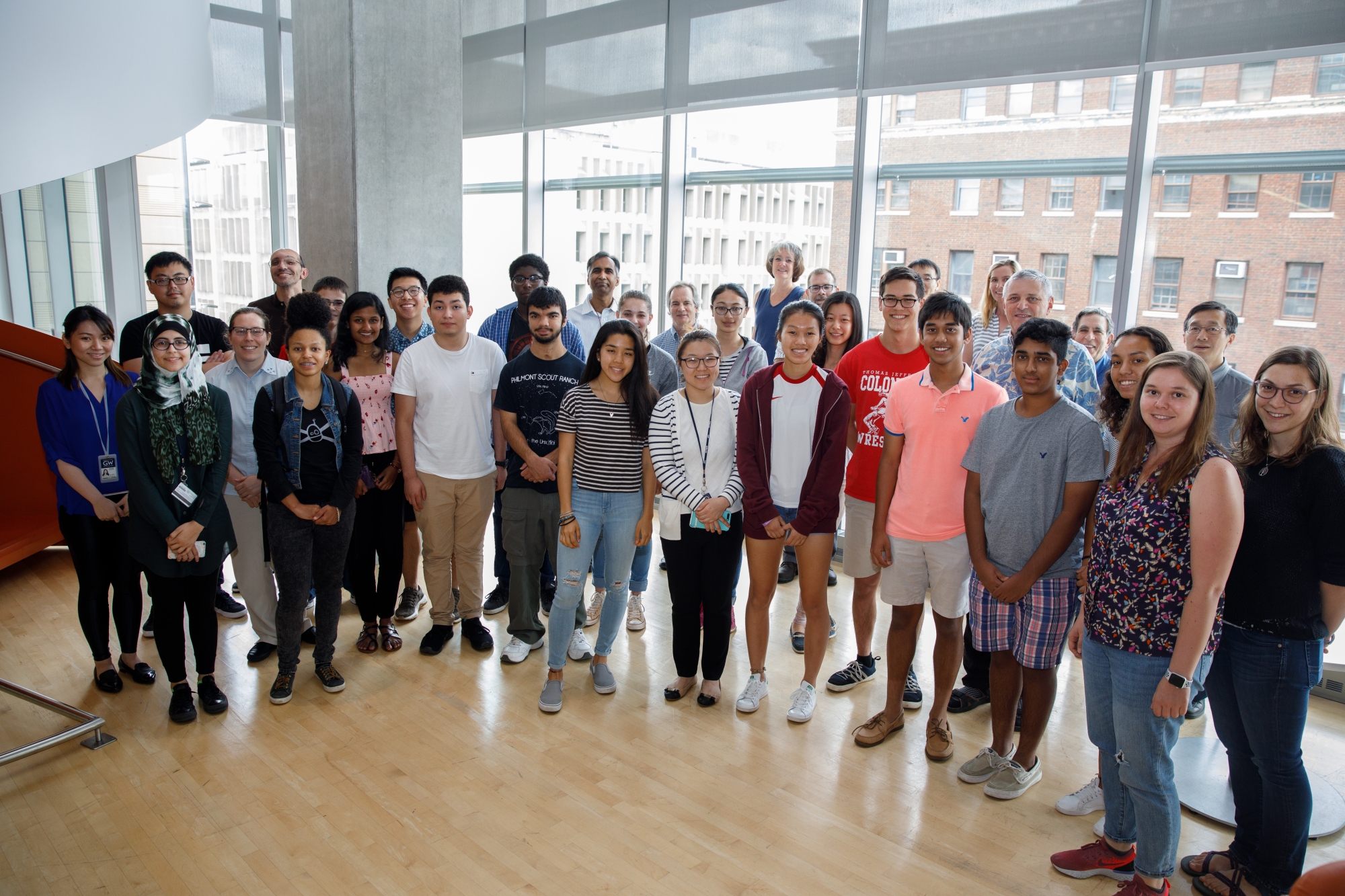 Group of high school researchers posing in the Science and Engineering Hall
